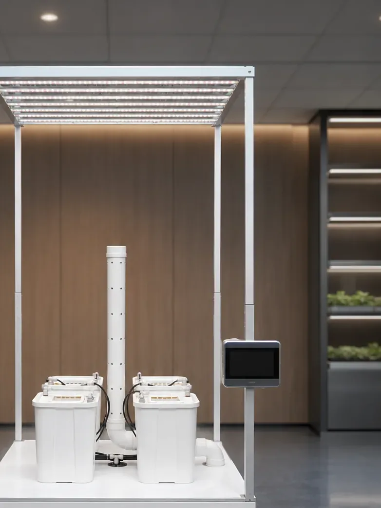 Pegma Omni smart vertical growing system with LED top lighting planting buckets and touchscreen control detail view